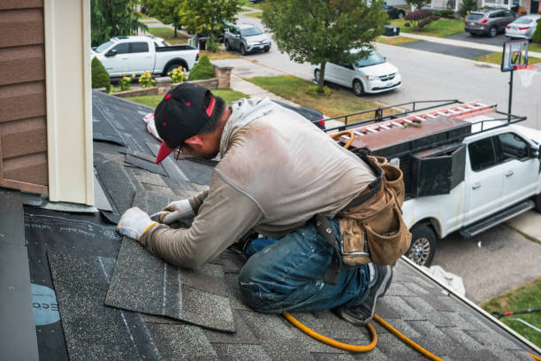 Professional Gutter Repair And Installation technician working in Merlin, OR